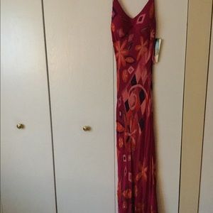 Beautiful sparkly print long gown. Never worn.